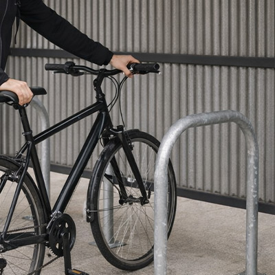 Putting bike against the hoops