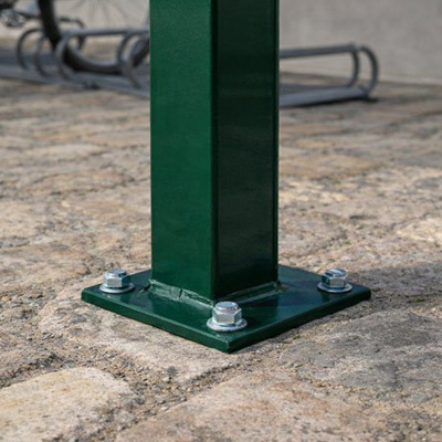 Close-up of foot bolted to ground