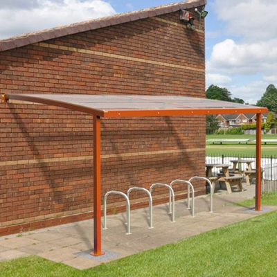 Action shot of orange TUFF Wall Mounted Shelter outside